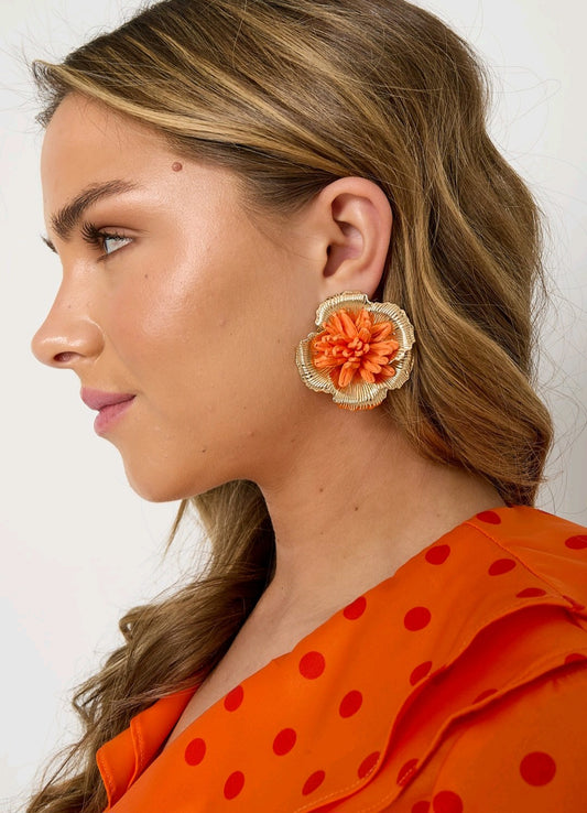 Statement oranje bloem oorbellen
